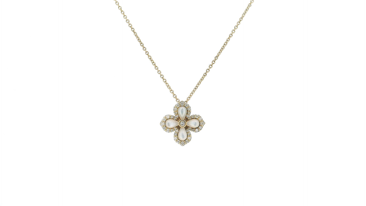 Elegant Gold Pendant with Gemstone Accents