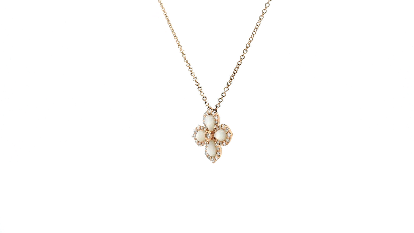 Elegant Gold Pendant with Gemstone Accents